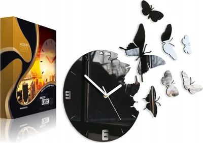 A product shot of a wall clock with butterfly decorations and its packaging.