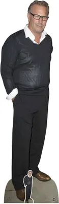 A cardboard cutout of Kevin Costner standing.