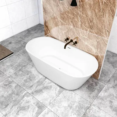 A modern bathroom with a freestanding oval bathtub.