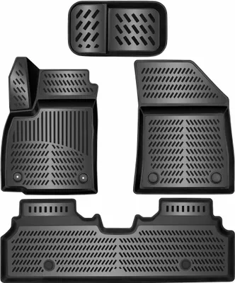 A set of car floor mats arranged on a white background.