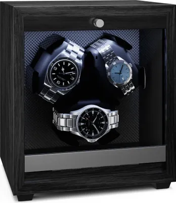 A watch winder with three watches inside, displayed in a dark wooden case.