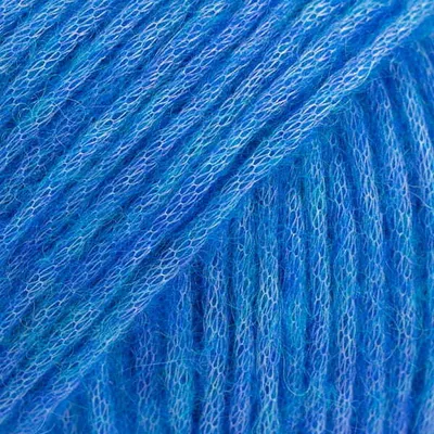 A close-up, abstract view of blue yarn.