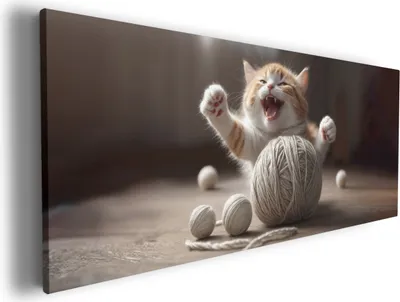 Produktbild von Wallario Premium Leinwandbild Katze mit Wollknäuel in Größe 60 x 150 cm