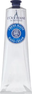 A close-up studio shot of a L'Occitane Shea Butter Hand Cream tube.