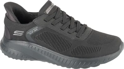A black Skechers slip-on sneaker is shown from a side angle against a white background.