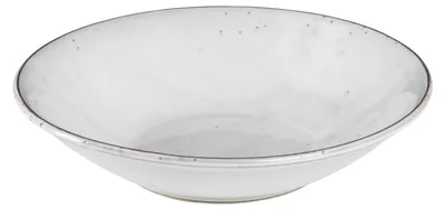 A white ceramic bowl with a speckled pattern and a dark rim.