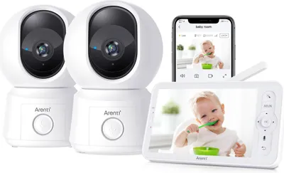 A baby monitor kit with two cameras, a handheld monitor, and a smartphone displaying the feed.