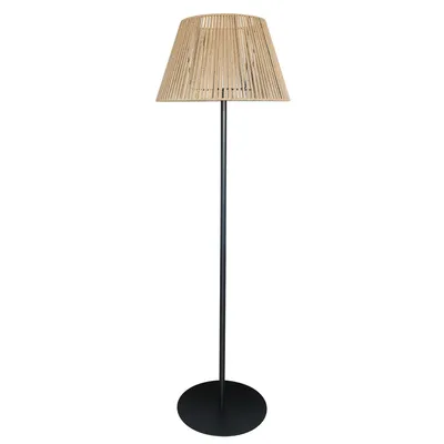 A floor lamp with a woven shade and a black base and pole, isolated on a white background.
