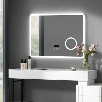 Zdjęcie produktu dla Lustro do łazienki LED marki Heilmetz, o wymiarach 80 x 60 cm, z oświetleniem, funkcją Bluetooth, powłoką antyfogową, zegarem, 3-krotnym powiększeniem, 3 kolorami światła i możliwością regulacji jasności