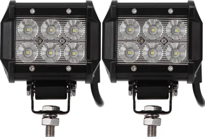 Two black LED work lights with silver reflectors are shown against a white background.