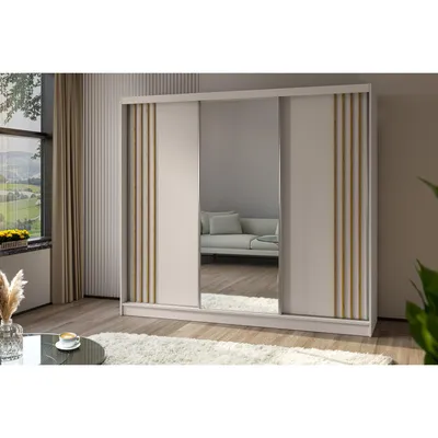 A modern bedroom or living room setting with a large sliding door wardrobe.