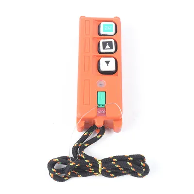 An orange remote control for an electric hoist or winch is shown against a white background.