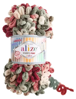 A ball of Alize Puffy Fine Color yarn with a label.