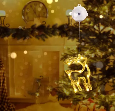 Produktbild von Weihnachtsbeleuchtung für die Schaufenster, 10 LEDs, warmweiß, batteriebetrieben, Saugnäpfe, Rentier