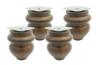 Four wooden furniture legs with metal plates on top, arranged in a group on a white background.