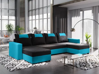 A modern living room with a large sectional sofa.