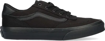 A side view of a black Vans sneaker.