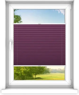 A window with a purple pleated blind partially covering the view of a green landscape with trees and a blue sky.