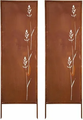Two identical metal garden screens with a rust-like finish and a white grass-like design are shown side-by-side against a white background.