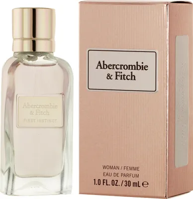 A bottle of Abercrombie & Fitch First Instinct perfume and its packaging are displayed against a white background.