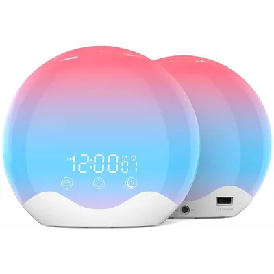 Two sunrise alarm clocks are shown against a white background. The front clock displays the time '12:00' and several icons.