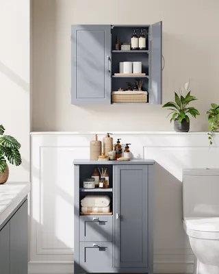 A bathroom vanity and wall cabinet are shown in a well-lit room.