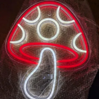 A neon LED mushroom-shaped light.