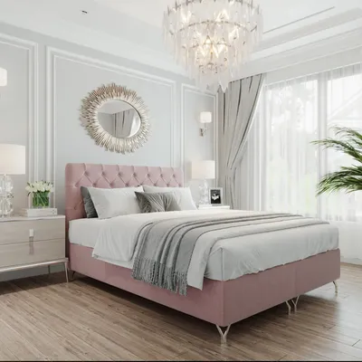 A bedroom scene with a pink upholstered bed as the main focus.