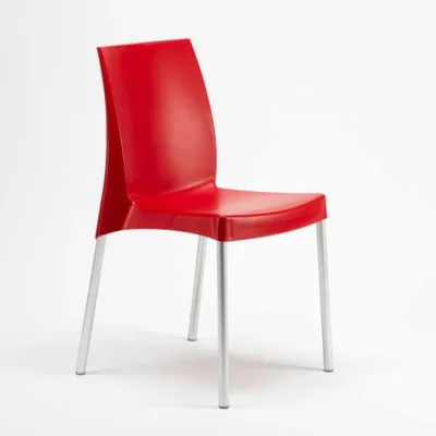 A red chair with silver legs on a white background.