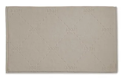 A beige JOOP! bath mat with a diamond pattern and embossed logo.