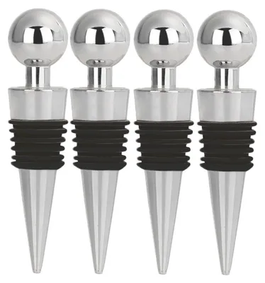 Four silver and black wine stoppers arranged in a row.