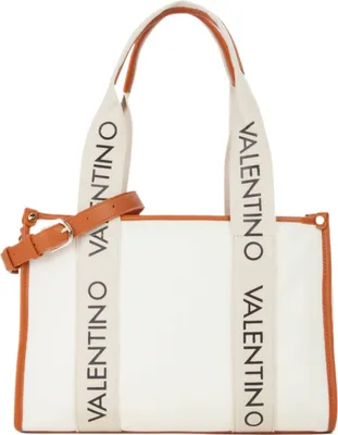 A white canvas tote bag with brown leather trim and handles, featuring the "VALENTINO" logo printed vertically on straps.