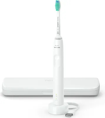 A white electric toothbrush and its charging base are displayed against a white background.