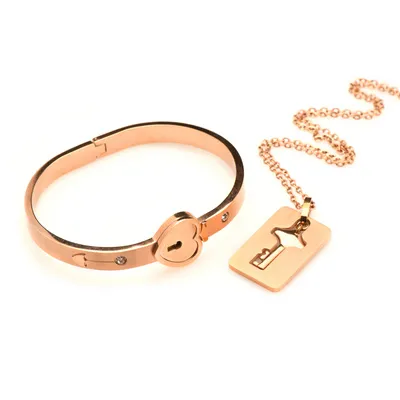 Immagine prodotto di Bracciale con chiusura a polsino e collana di chiavi - Oro rosa