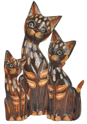 Three wooden cat figurines of varying sizes are arranged together against a white background.