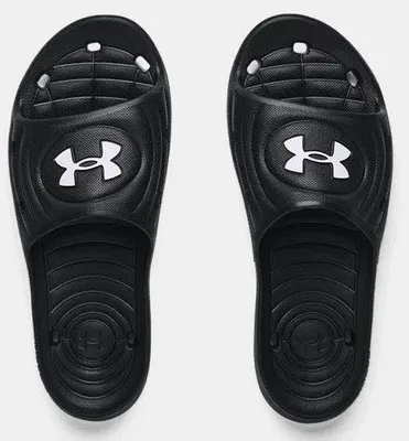 A pair of black Under Armour slides shown from a top-down perspective against a white background.