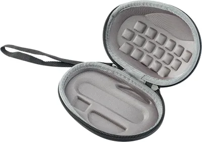 An open hard case for a computer mouse, showing the interior padding.