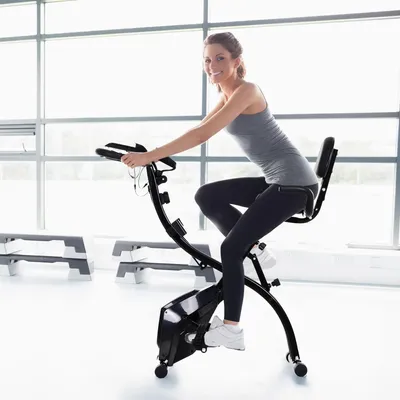 Zdjęcie produktu dla Składany rower stacjonarny do ćwiczeń, wyposażony w hamulec magnetyczny, wytrzymały do 120 kg, cichy rower stacjonarny X-Bike z pasami oporowymi, wyświetlacz LCD, uchwyt na tablet, kolor czarny