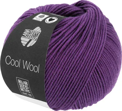A ball of purple yarn with a label.