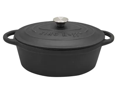 A black cast iron pot with a silver lid handle is shown against a white background.