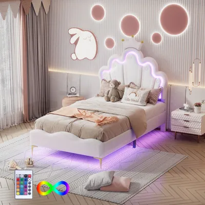 A child's bedroom with a white bed featuring LED lighting, decorative wall art, and curtains.