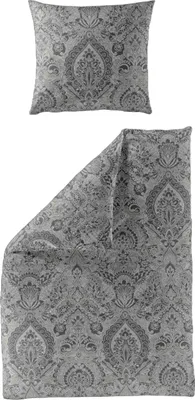 A pillowcase and a duvet cover are shown laid out against a white background.