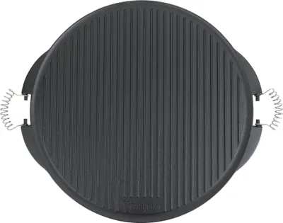 A top-down view of a round, black cast iron grill plate with raised ridges and two silver spring handles on the sides.