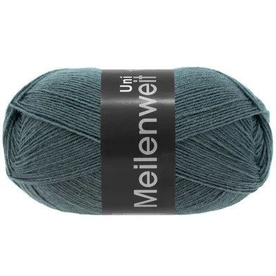 A ball of teal yarn with a black label.