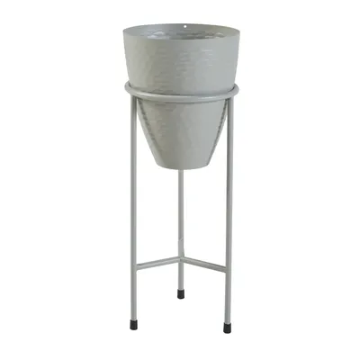 A light gray metal planter on a stand, shown against a white background.