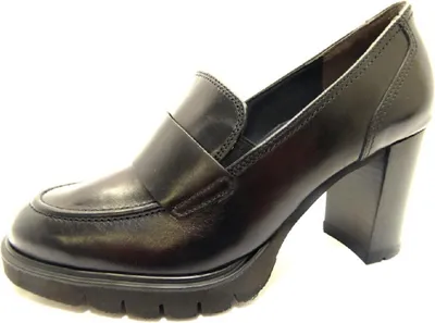 A single black pump shoe with a platform and block heel is shown against a white background.