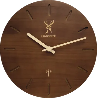 A wooden wall clock with a deer logo and the text "Holzwerk" printed on it.