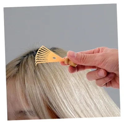 Produktbild von Kompaktes Kopfmassagegerät mit innovativem Krallendesign zur Linderung von Kopfschmerzen