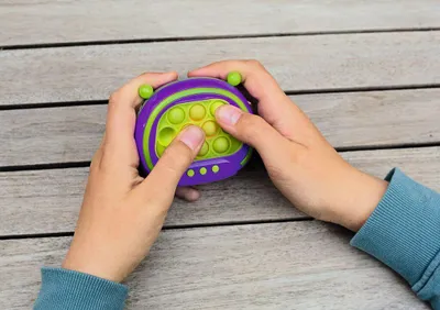 Produktbild von Bubble Pop-It Spiel, 4 Spielmodi, Licht und Sound, lila/grün