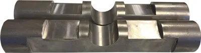 A metal adapter for a mini excavator.